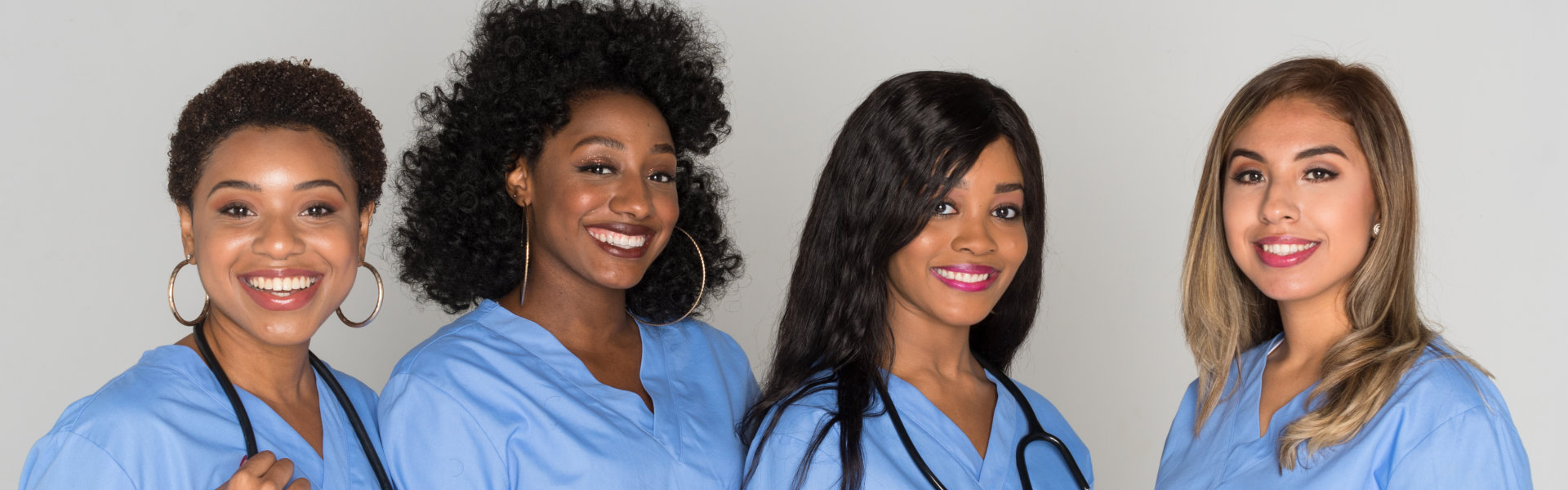 group of female nurses smiling